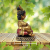 The Global Store - Bal Krishna ji statue - sitting and holding makhan ghada in hand - depth