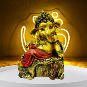 The Global Store - Ganesh ji - Sitting on golden sofa one leg folded on sofa hand on knee in rest position, musak is sitting close to sofa