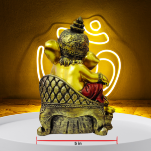 The Global Store - Ganesh ji - Sitting on golden sofa one leg folded on sofa hand on knee in rest position, musak is sitting close to sofa-w