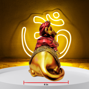 The Global Store - Ganesh ji - sitting on musak his vehicle cloth weared painted maroon ganesh ji and vehicle is golden - depth