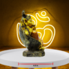 The Global Store - Ganesh ji statue - sitting on big sofa which looks like leaf musak sitting close to feet - depth