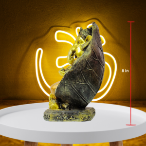 The Global Store - Ganesh ji statue - sitting on big sofa which looks like leaf musak sitting close to feet - height