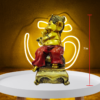The Global Store - Ganesh ji statue - sitting on sofa and holding one plate of ladoo - height