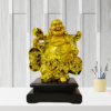 The Global Store - Laughing buddha statue - complete golden wooden base colored black looks like traveler - bg