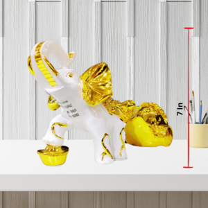 The Global Store - elephant statue - attached trolly at back made of marble dust coated with white and golden paint - height